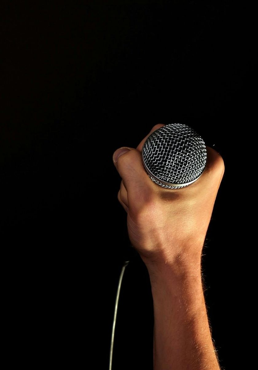 Artist holding microphone